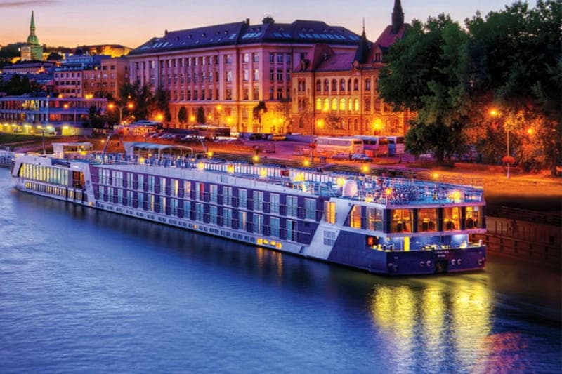 AmaWaterways ship moored beneath Rhine vineyards