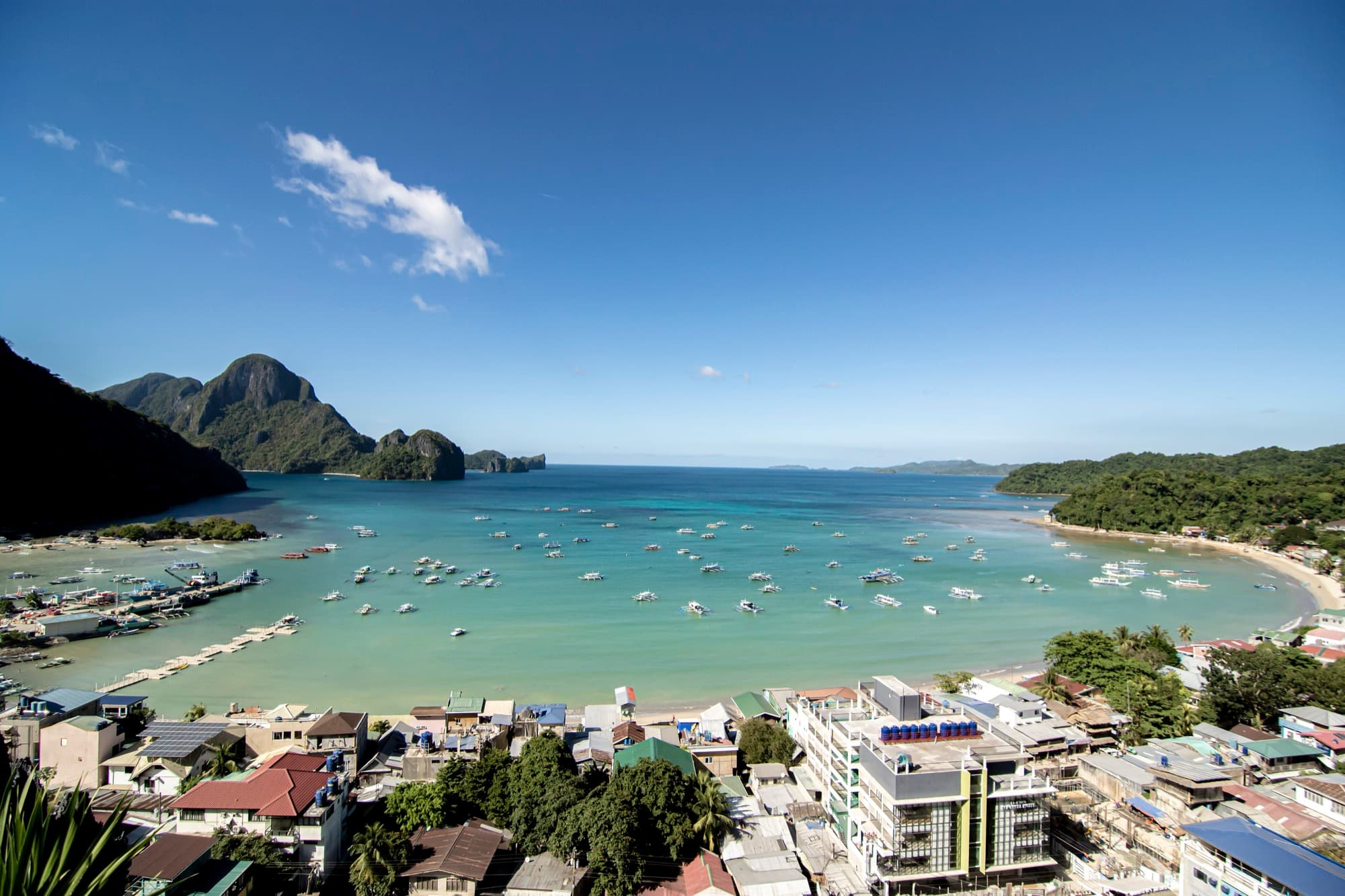 Limestone cliffs and clear shallows at the Big Lagoon, El Nido